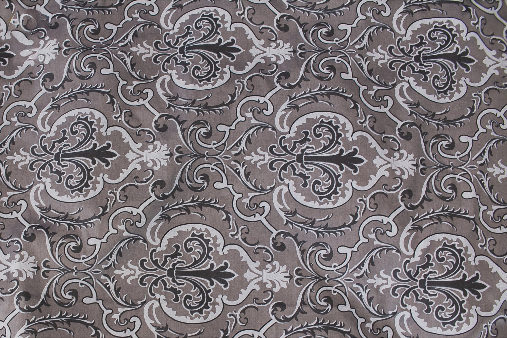 Fabric texture of grey floral sateen bed linen by Once@Home with soft sheen and fine pattern