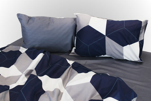 Sateen bed linen with blue, grey, white and beige geometric pattern by Once@Home