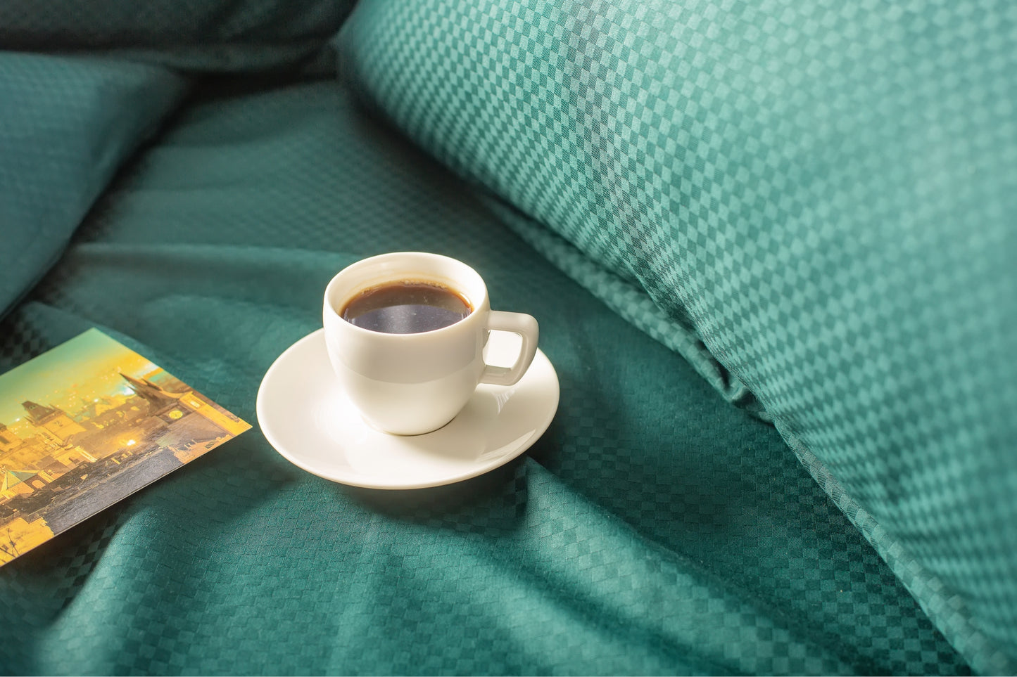 Close-up of emerald stripe sateen bed linen by Once@Home highlighting the subtle striped pattern and refined finish